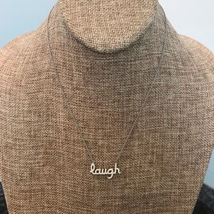 Silver tone “Laugh” necklace with stones 17 in